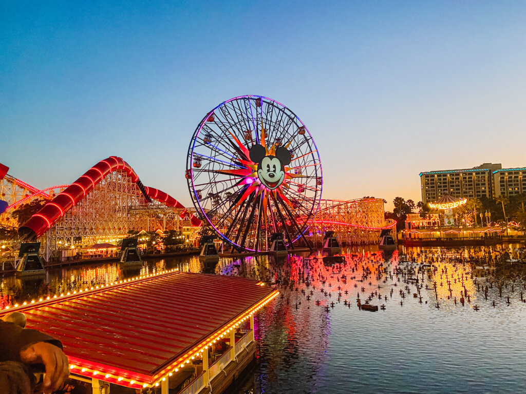 the ferris wheel at Disney California Adventure lit up at sunset