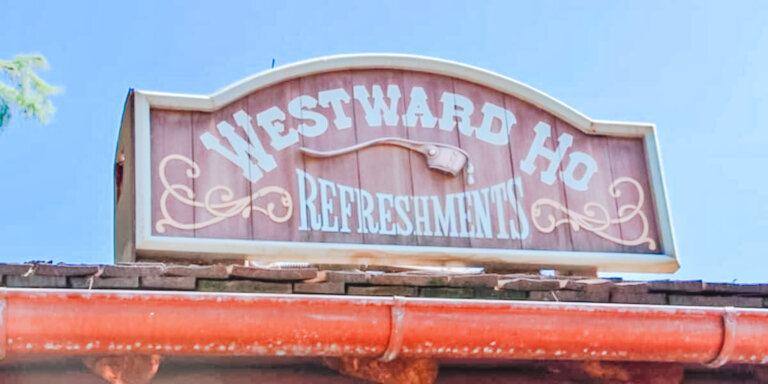 Westward Ho sign on top of the Westward Ho stand in Magic Kingdom