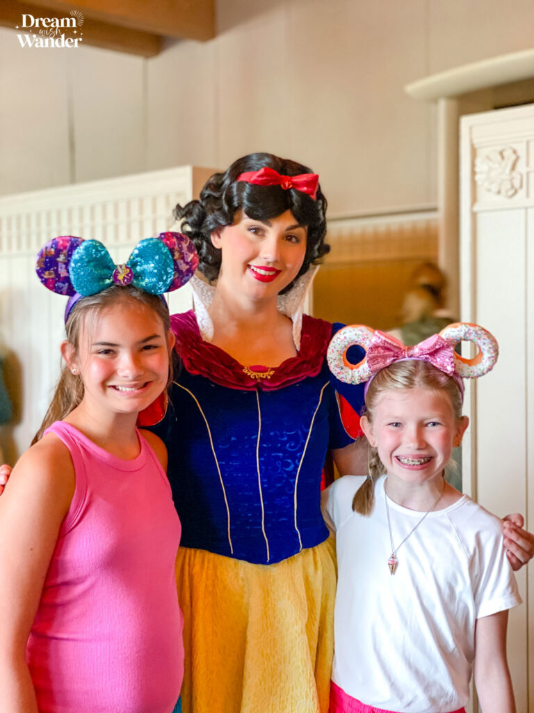 Storybook Dining at Artist Point image of 2 girls with Princess Snow White