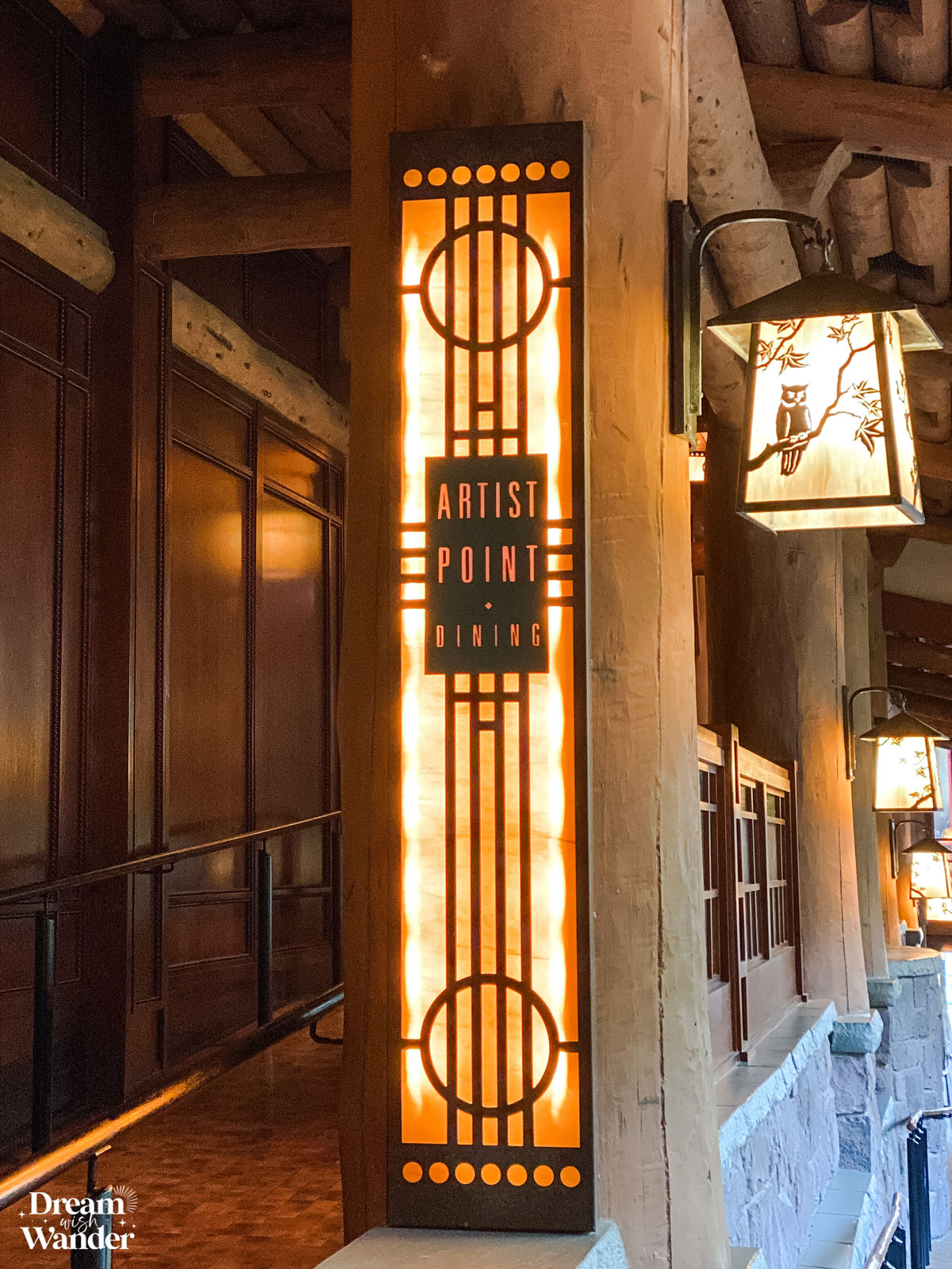 Restaurant sign for Storybook Dining at Artist Point at Disney's Wilderness Lodge - a character dining experience